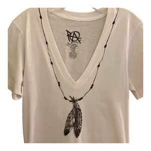 White hand printed T-shirt. Original art. All cotton. Art is feathers & …Coastal